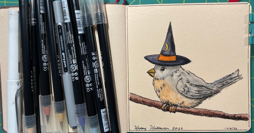 Happy Halloween 2022
A little bird with a witch's hat sitting on a branch.